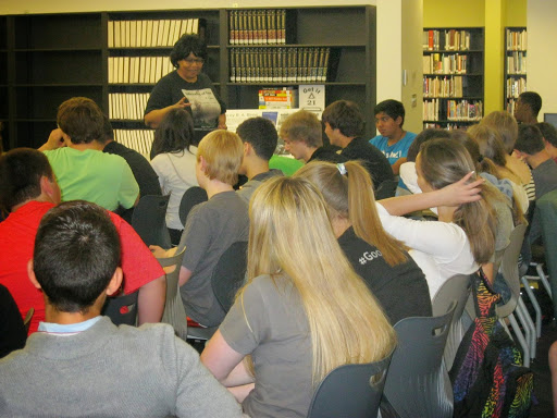 Barbara Binns leading a class in a school workshop